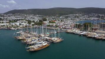 Aerial view of yachts in the harbor of the Turkish city of Bodrum. The old fortress is in the background. video