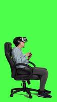 Profile Female player uses virtual reality headset to play with friends online on internet connection, has fun with gaming competition. Gamer playing in tournament with vr interactive glasses. Camera A. video