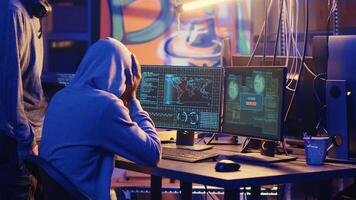 BIPOC hackers in secret headquarters targeting vulnerable unpatched connections, frustrated after failing to get past computer defenses and steal valuable sensitive data, access denied error photo