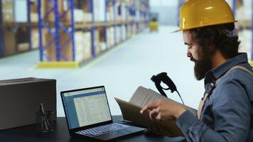 Export manager creating invoice for cargo shipment, working on delivery and transportation logistics. Warehouse employee checking dispatch notes for order receipt, inventory management. photo