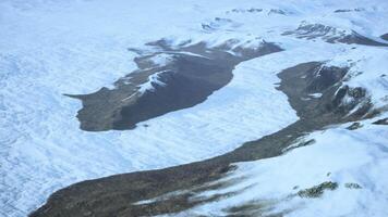 Snow covered mountain range seen from above video