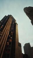 vertical format of looking directly up at the skyline of the financial district video