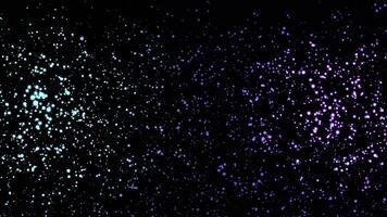 Beautiful abstraction of multicolored particles rotating and floating in the dark. Animation. Dynamic colorful animation on the black background photo