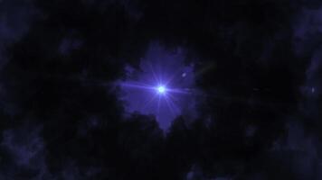 Dramatic dark bright fluffy clouds flying around lonely shining star. Animation. Abstract beautiful sky of dark blue color, bottom view of abstract nature at night. photo