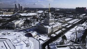 Top view of large square with historical architecture in winter. Creative. Historic square with alleys and Soviet architecture in city center. Winter landscape with Soviet architecture on background photo