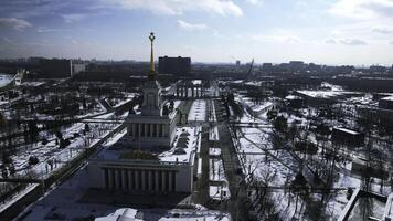 Top view of large square with historical architecture in winter. Creative. Historic square with alleys and Soviet architecture in city center. Winter landscape with Soviet architecture on background photo