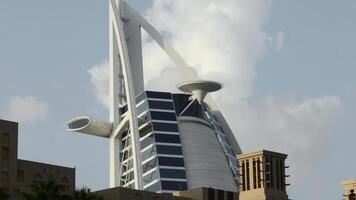 Dubai city architecture under blue sky. Action. High rise buildings in the city center. photo