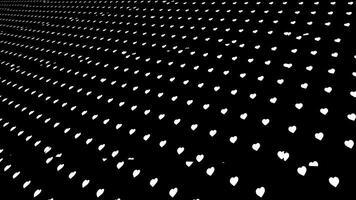 Derecho diagonal filas de blanco pequeño corazones en un negro antecedentes. animación. interminable campo de corazones, monocromo. foto