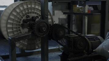 A mechanism with rotating gears. Creative. Industrial background at the workshop. photo