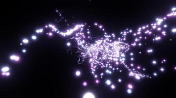 Abstract purple tiny glowing dots flying on a black background. Design. Stream of bright sparks. photo