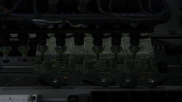 Electronic circuit board with processor, chips and capacitors. Creative. Tech science, computer chip, quality control background. photo