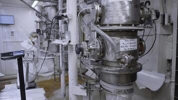 View inside of the industrial dairy production facility. Clip. Huge containers at modern industrial factory. photo