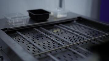 Empty automatic metallic conveyor belt. Media. Production line at the factory. photo