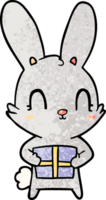 lapin de dessin animé mignon avec cadeau png