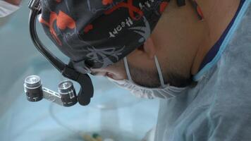 Close up of surgery performed by professional specialists. Action. Concentrated work of a surgeon. video