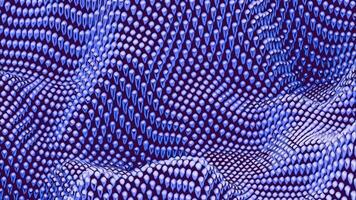 Canvas waves of small spheres. Design. 3d metallic glowing beads moving up and down. video