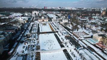 Top view of large square with historical architecture in winter. Creative. Historic square with alleys and Soviet architecture in city center. Winter landscape with Soviet architecture on background video