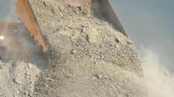 Close-up of the limestone ore unloading from mining truck. View from back. video