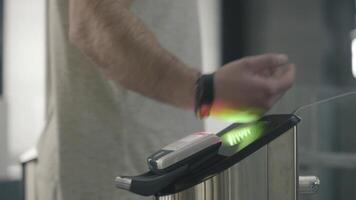 Turnstiles with electronic card readers. Frame. New technologies in a subway video