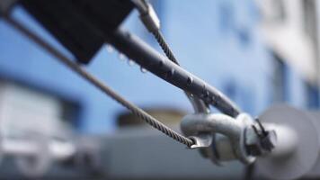 Connection with a steel cable. Frame. Close-up of metal parts video