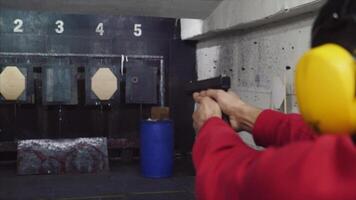 Shoot in dash from pistol. A man shoots a gun in the dash video