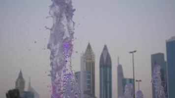 Water of dry fountain in the park close-up. Water shooting out of a fountain. Streams of fountain close-up. Slow motion video