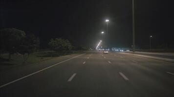 Night highway. Video. View through the car windshield video