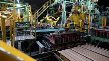 Raw ceramic blocks being transported automatically by professional machinery at the manufacturing plant. Stock footage. Rows of ceramic blocks on a conveyor belt at the factory. video