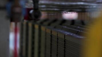 Industrial background with raw ceramic blocks being cut by saw string. Stock footage. Brick and block production, conveyor belt with raw ceramic blocks at the factory. video