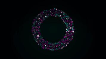 Abstract 3D ring created by tiny small particles that flying away isolated on black background. Animation. Colorful squares moving into all the sides. video