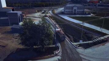 Aerial of loaded dumper truck moving from the quarry to the industrial plant, heavy machinery concept. Stock footage. Truck are working in the sand quarry. video