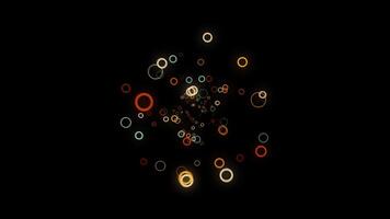 Abstract beautiful random flow of colored round forms on black background, 3D effect. Animation. Many small rings moving towards the camera. video