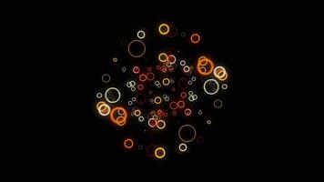 Abstract colorful rings flowing slowly towards the camera on black background, seamless loop. Animation. Yellow and orange circles moving and getting closer. video