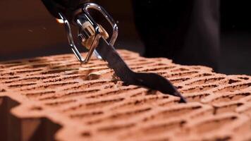 Close up of the builder saws the ceramic blocks with an automatic saw. Stock footage. Construction of new building concept. video