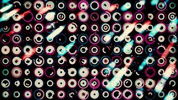 Abstract futuristic background with moving small circles and small particles moving behind them on the background. Animation. Many moving rings on black background, seamless loop. video