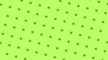 Abstract colorful pattern of small green leaves rotating and moving up on the green background. Animation. Seamless loop animation video