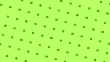 Abstract colorful pattern of small green leaves rotating and moving up on the green background. Animation. Seamless loop animation video