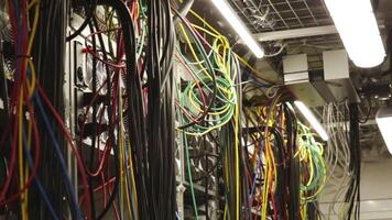 IT professionals concept. Stock footage. Close-up of data center of the large company with lots of fans, system units and wires. video