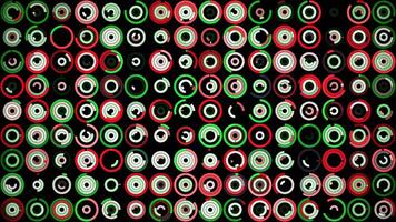 Plenty of small multicolored circles spinning on the black background in different sequence. Animation. Beautiful abstract background. video