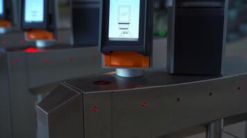 Close-up of passing through electronic turnstile with barcode scanner. Media. Using smartphone to get access inside the building. video