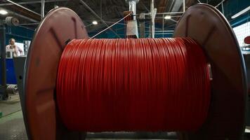 Cable production workshop and large coil. Creative. Modern cable manufacturing factory details. video