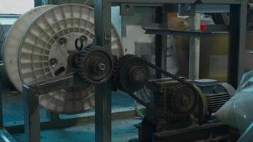 A mechanism with rotating gears. Creative. Industrial background at the workshop. video