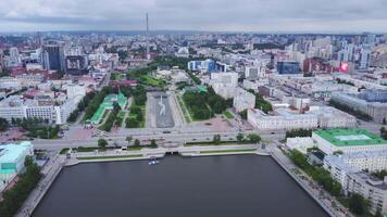 Aerial of modern office buildings and residential houses. Stock footage. Drone view of contemporary residential district, concept of urbanization. video