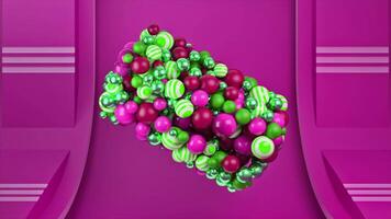 Abstract multicolored spheres rotating in a formed 3D figure isolated on bright pink background, seamless loop. Animation. Abstract form of large and small glossy balls. video