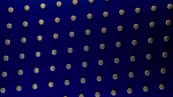 Abstract rotating dark blue background with white round dots, seamless loop. Animation. Spinning pattern with white circles contrasting to blue backdrop. video