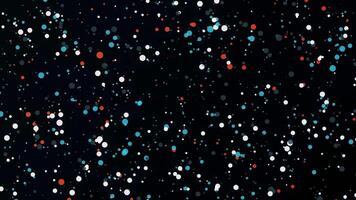 Background of colored dots moving on black background. Animation. Lot of new year's color dots move randomly on black background. Beautiful moving and disappearing dots in Christmas colors video