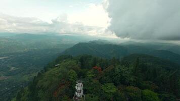 View of green mountains from ancient tower. Action. Beautiful view of green mountains from historic tower. Tourist observation deck from ancient tower in green mountains video