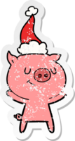 happy hand drawn distressed sticker cartoon of a pig wearing santa hat png