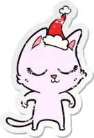 calm hand drawn distressed sticker cartoon of a cat wearing santa hat png