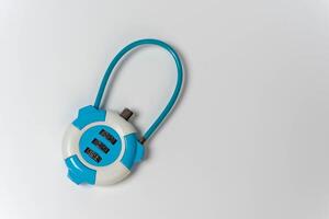 Close-up of combination lock on white background with copy space photo